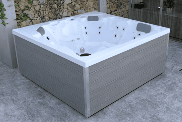 Outdoor Whirlpool Infinitas SE400 mit 52 Massagedüsen, moderner LED-Beleuchtung und exklusivem Design für Garten und Wellness.