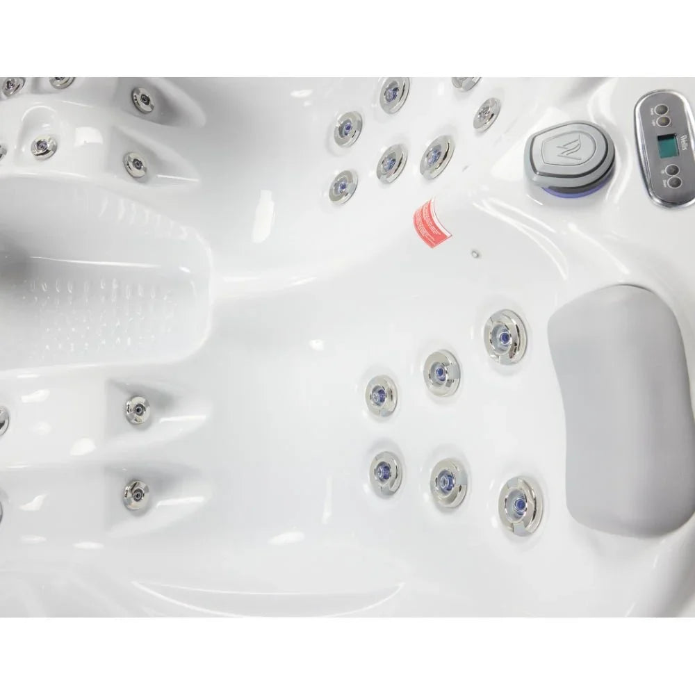 Detailansicht Whirlpool Wellis Mars, weiße Acryl-Oberfläche mit Massagedüsen und Kopfstütze