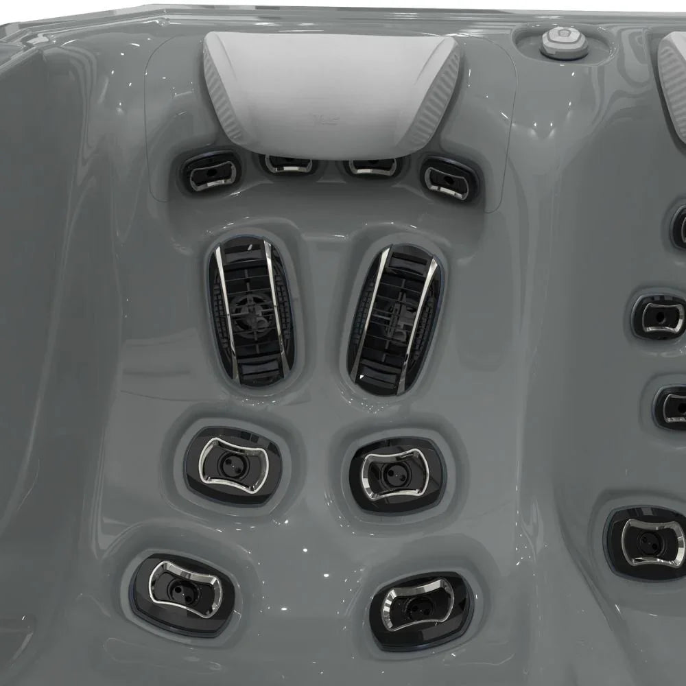 Detailansicht Wellis Whirlpool Innenraum mit Massagejets und ergonomischer Kopfstütze, grau