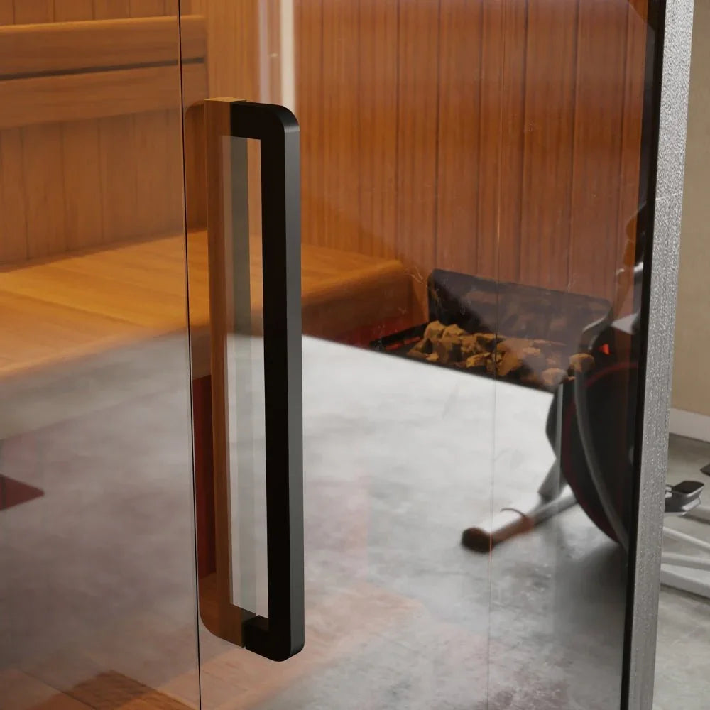 Moderne Indoor Sauna mit Glasfront, Holzbank und Saunaofen für luxuriöse Wellnessmomente