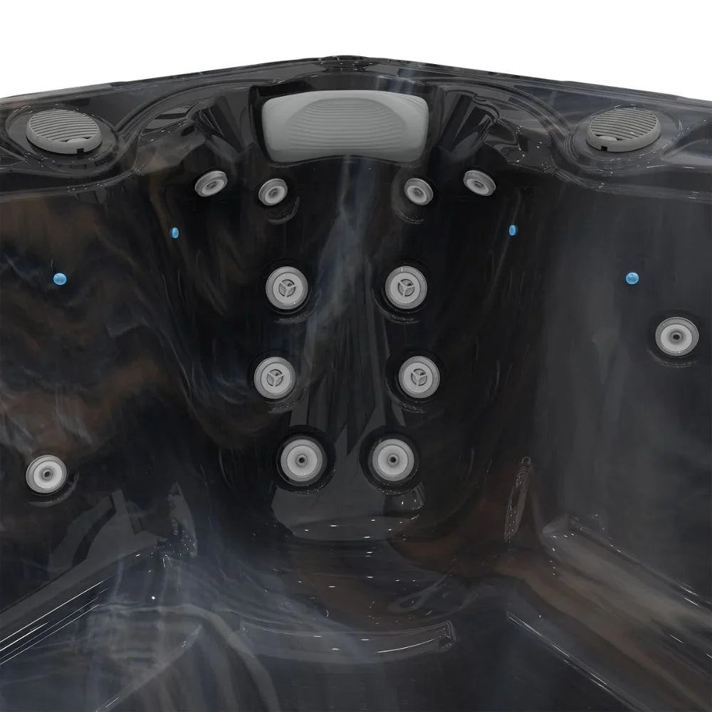 Detailansicht Wellis Whirlpool Innenraum, schwarze Acryloberfläche, Massagedüsen, Kopfstütze
